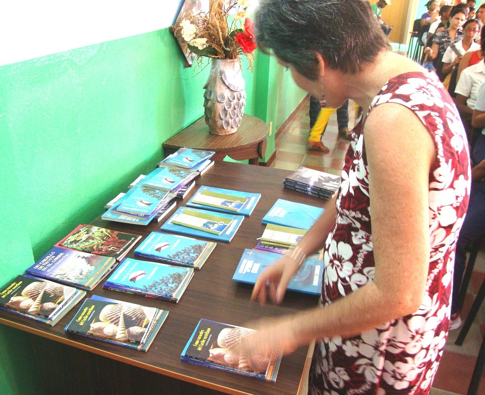 Celia arranging the Spelling Contest prizes