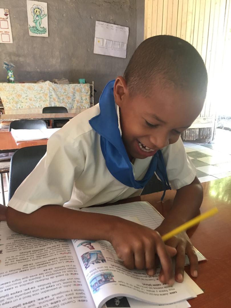Rural school student using the Illustrated School Dictionary