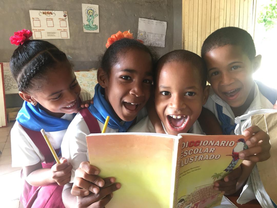 School children excited about their new dictionary